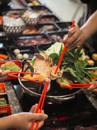 Midsection of man preparing food