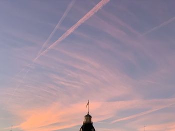 High section of building against sky during sunset