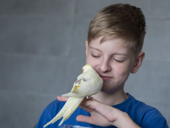 Portrait of boy eating food