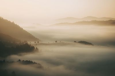 Scenic view of mountains against sky during sunset