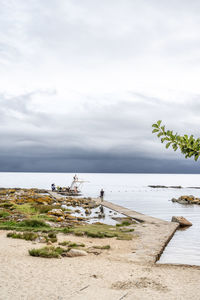 The beach at svaneke old lighthouse, bornholm, denmark