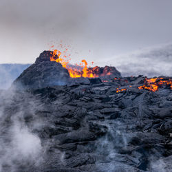 View of bonfire on mountain