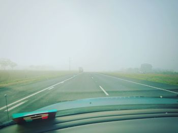 Road passing through forest