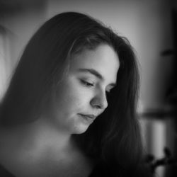 Close-up of beautiful woman looking away