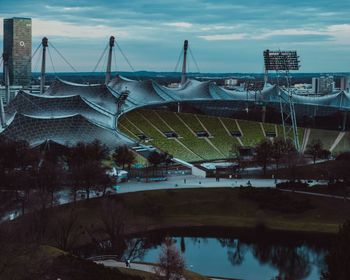 High angle view of bridge over river in city against sky