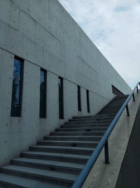 Low angle view of staircase against sky