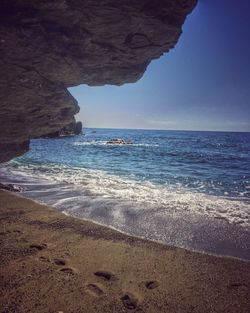 Scenic view of sea against blue sky