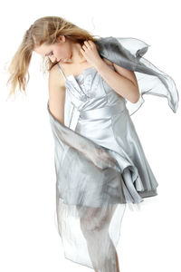 Young woman wearing hat against white background