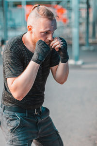 Young man looking at camera