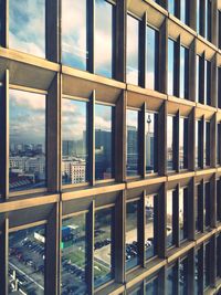 Modern buildings seen through glass window