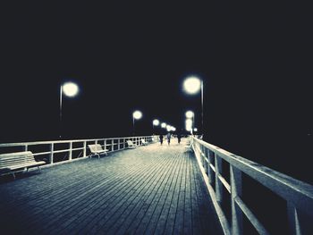 View of illuminated bridge at night