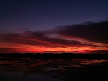 Scenic view of dramatic sky during sunset