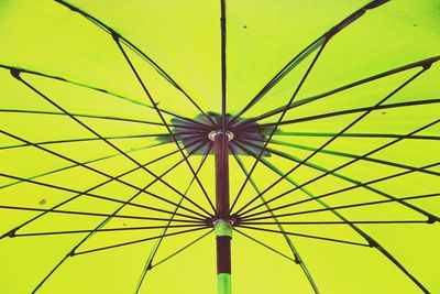 Low angle view of umbrella against clear sky