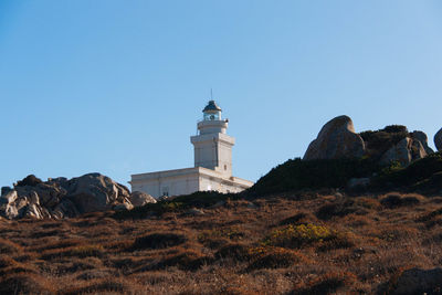 Low angle view of lighthouse against clear sky