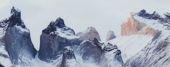 Snowcapped mountains against sky