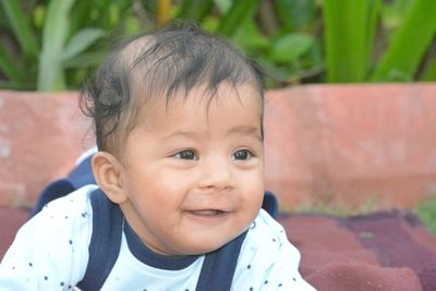 Portrait of cute boy smiling