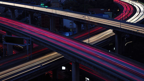 High angle view of light trails on elevated road at night