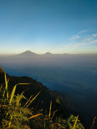 Scenic view of landscape against sky during sunset