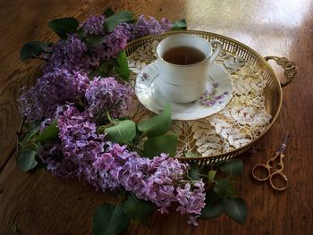 High angle view of coffee served on table