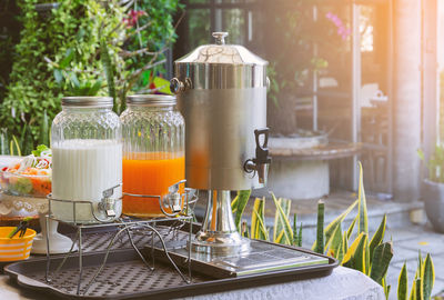 Table and chairs in glass container