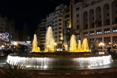 Illuminated buildings at night