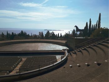 Panoramic shot of building by sea against sky