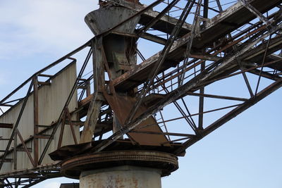 Low angle view of old bridge against sky