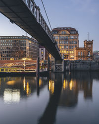 Germany, hamburg, bridge in front of historic haus der seefahrt building
