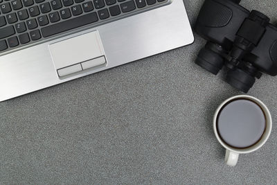 High angle view of coffee cup on table
