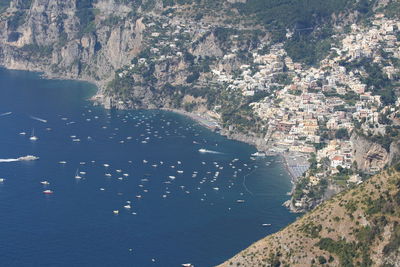 High angle view of city by sea