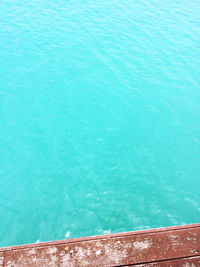 High angle view of swimming pool against blue sea