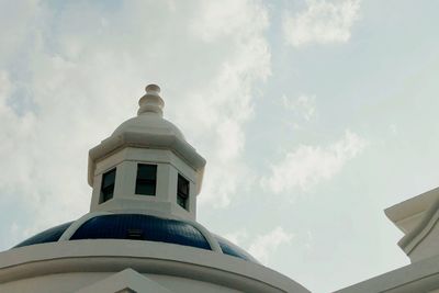 Low angle view of church dome against sky
