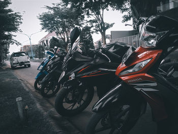 Bicycles parked on street in city