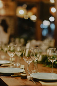 Close-up of wineglasses on table