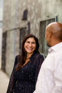 Portrait of a smiling young woman outdoors