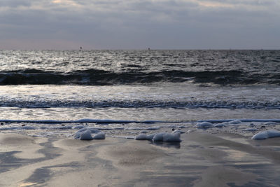 Scenic view of beach against sky