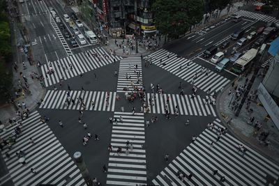 High angle view of people walking on road