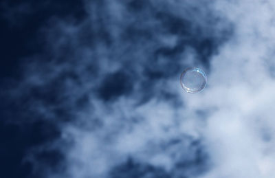 Low angle view of moon against sky