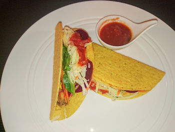 Close-up of served food in plate