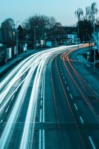 High angle view of light trails on road