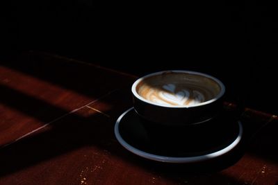 Close-up of cappuccino on table