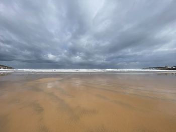 Scenic view of beach against sky