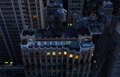 High angle view of residential buildings in city of manhattan new york at night