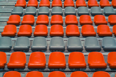 Close-up of red seats in row