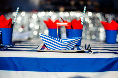 Close-up of red wine glasses on table