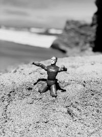 Boy toy on sand at beach