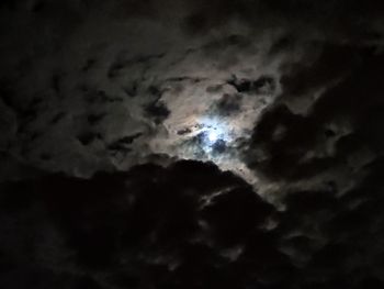 Low angle view of dramatic sky at night