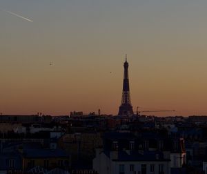 Buildings against sky during sunset