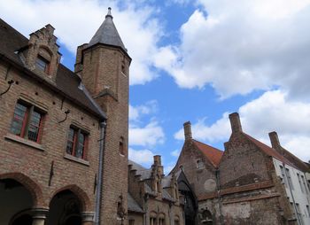 Low angle view of old building against sky