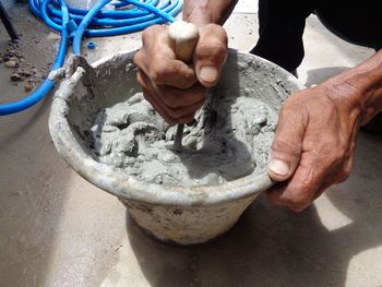 Close-up of person preparing food